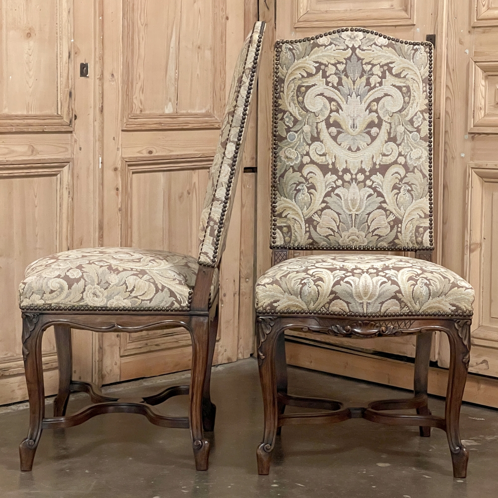 Antique pair of French Louis XV style side chairs.