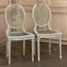 Pair 19th Century French Louis XVI Caned Chairs with Distressed Painted Finish